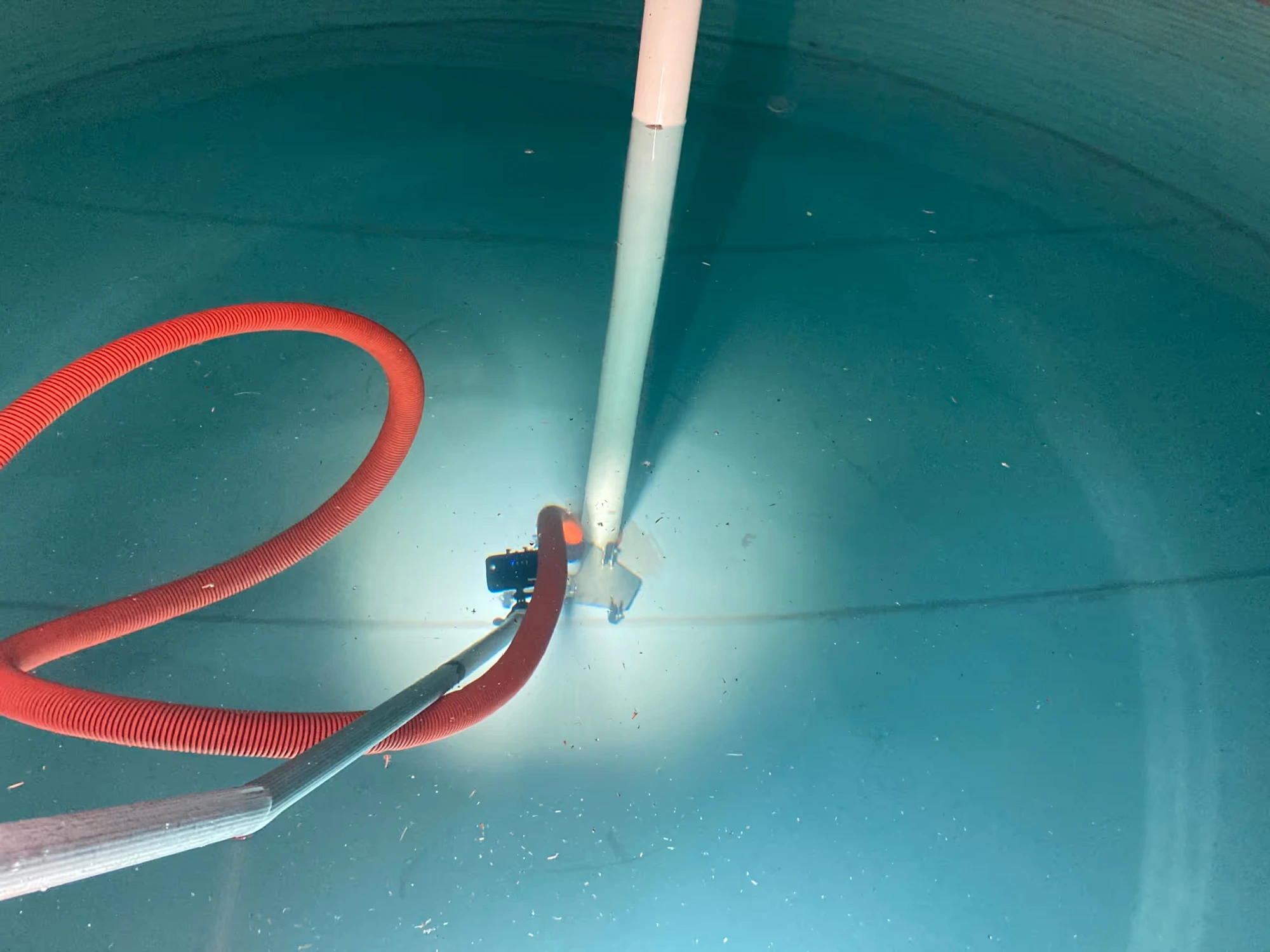Clear rainwater tank interior after the QuadClean process — water visibly clean
